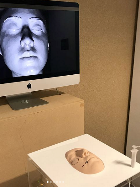 Picture of interactive art display with a face 